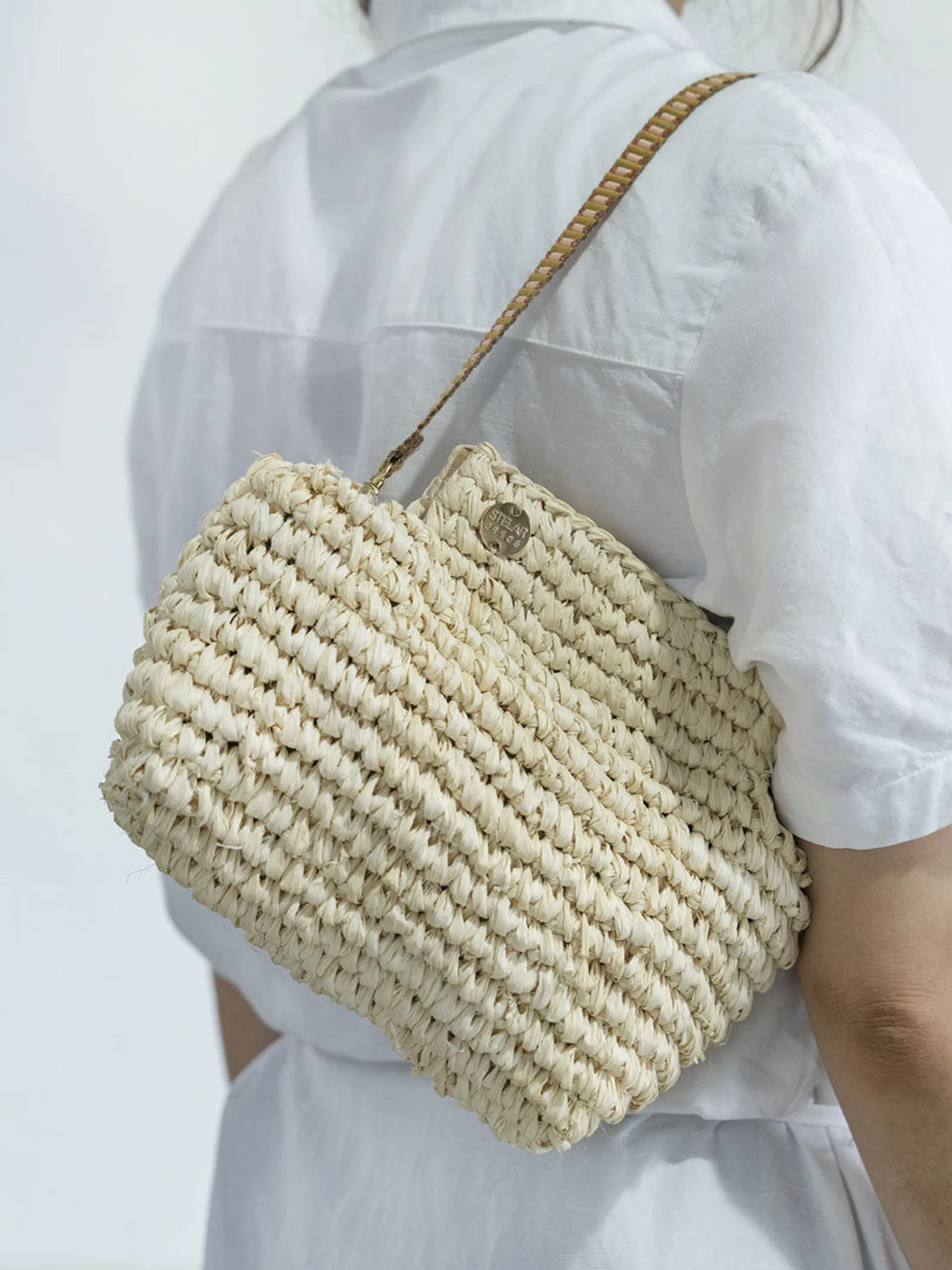 Lilis small raffia frame clutch bag