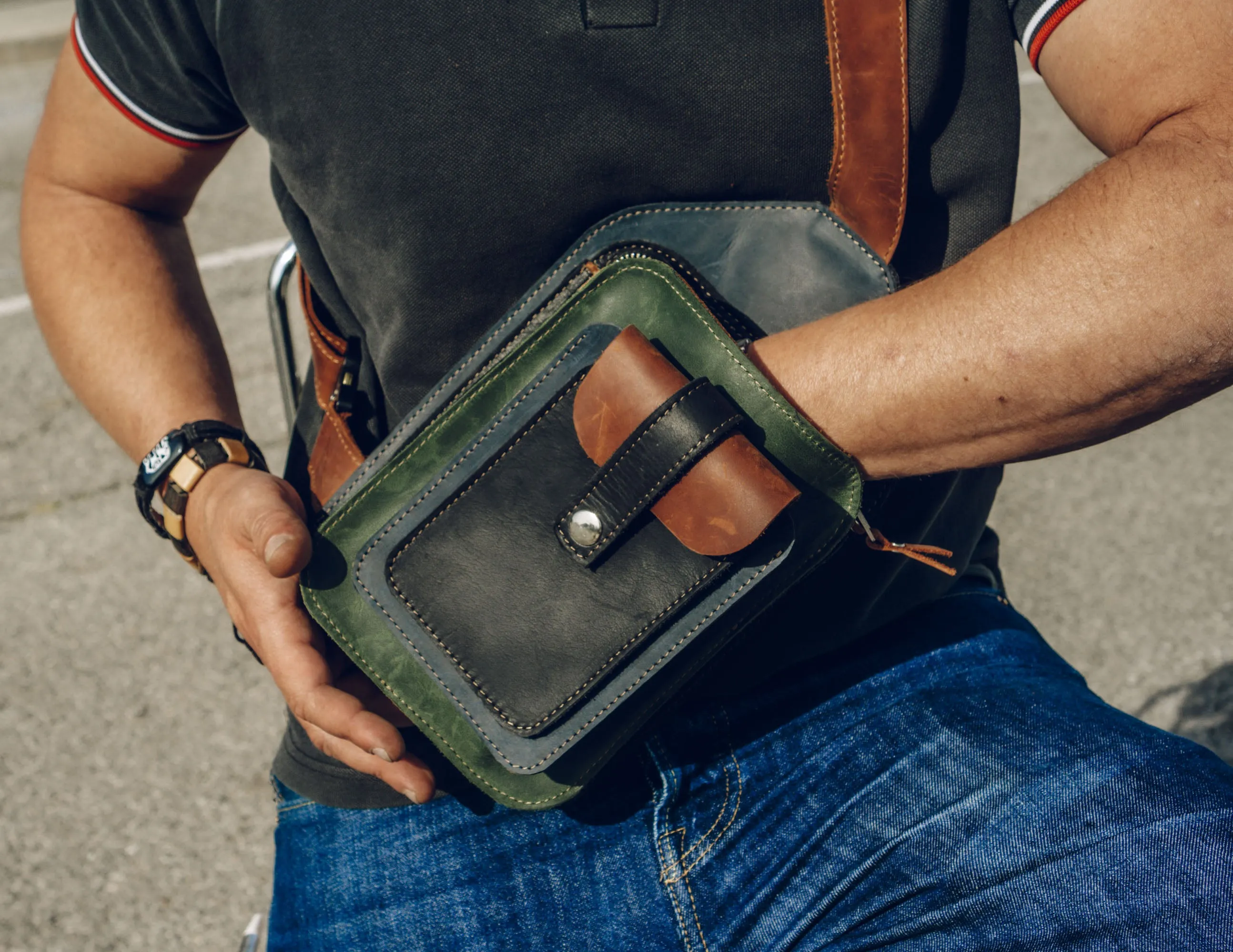 Men's crossbody bag featuring green, brown, blue, black leather and multiple pockets