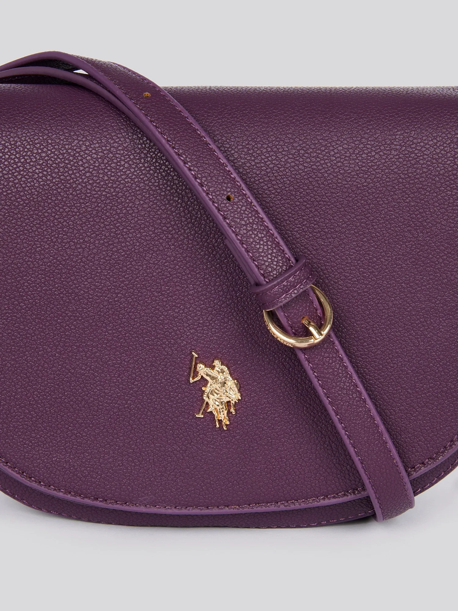 U.S. Polo Assn. Womens Jones Flap Crossbody Bag in Plum