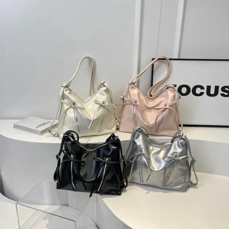 VAIGE Silver Small Bow PU Leather Shoulder Bag with Zipper Closure and Flap Pocket, Soft Baguette Shape, Versatile Crossbody Design