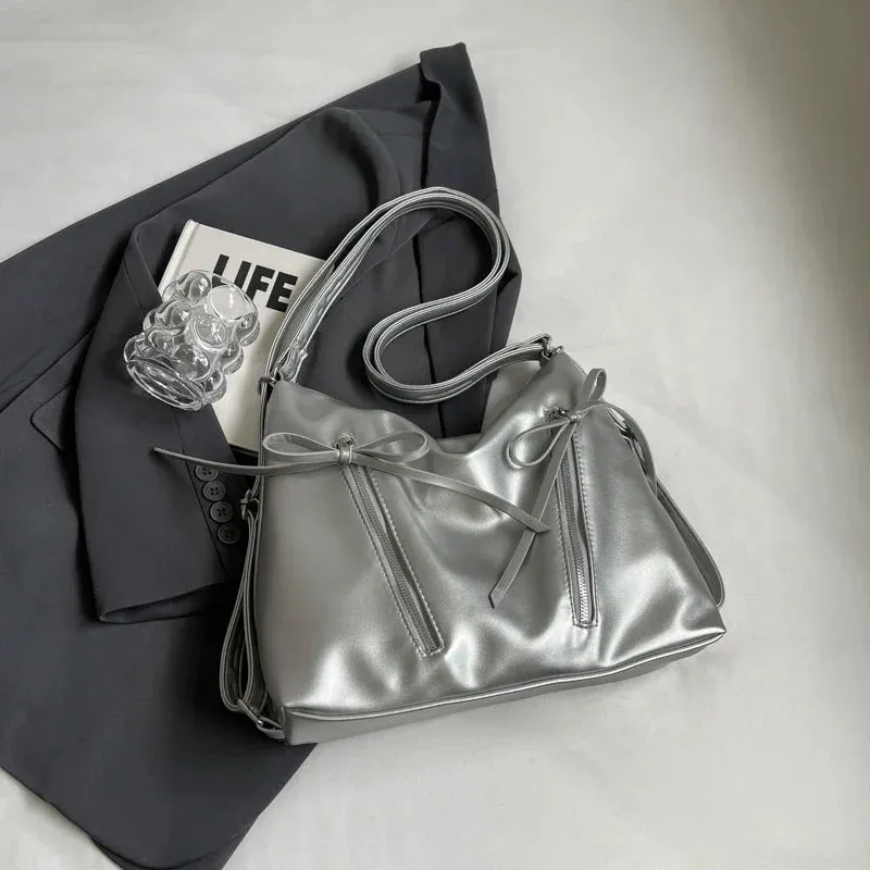 VAIGE Silver Small Bow PU Leather Shoulder Bag with Zipper Closure and Flap Pocket, Soft Baguette Shape, Versatile Crossbody Design